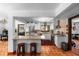 Modern kitchen featuring stainless steel appliances, breakfast bar, and white cabinetry at 6213 12Th S Ave, Gulfport, FL 33707