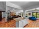 Spacious living area with terra cotta tile and views to the formal dining room at 6213 12Th S Ave, Gulfport, FL 33707