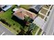 An aerial view showing the roof, surrounding landscaping, and neighborhood streets at 6446 Louisiana Ave, New Port Richey, FL 34653