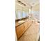 Bathroom featuring vanity with ample counter space and storage below at 6446 Louisiana Ave, New Port Richey, FL 34653