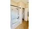 Bathroom with shower and tub combination plus closet for storage at 6446 Louisiana Ave, New Port Richey, FL 34653