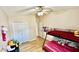 Bedroom featuring bunk beds, wood-look floors, and closet at 6446 Louisiana Ave, New Port Richey, FL 34653