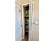 Linen closet with shelving for convenient storage of towels and toiletries at 6446 Louisiana Ave, New Port Richey, FL 34653