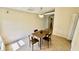 Dining room with tile floors, simple light fixture and furniture set at 6446 Louisiana Ave, New Port Richey, FL 34653