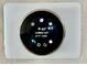 Smart thermostat showing interior temperature and humidity reading at 6446 Louisiana Ave, New Port Richey, FL 34653