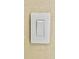 Light switch on a painted wall in a home at 6446 Louisiana Ave, New Port Richey, FL 34653