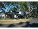 Charming home with a unique roof line surrounded by mature shade trees at 7033 123Rd St, Seminole, FL 33772