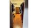 Walk-in closet with wood floors and plenty of storage space for clothes and accessories at 7033 123Rd St, Seminole, FL 33772