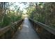 Community walking path through lush landscaping and natural surroundings at 7033 123Rd St, Seminole, FL 33772