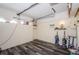 Finished basement space with durable floors, shelving, and functional lighting at 7420 Cay Dr, Port Richey, FL 34668