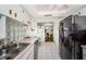 Well-organized kitchen featuring sleek appliances, ample counter space, and modern design elements at 7420 Cay Dr, Port Richey, FL 34668