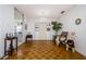 Spacious living room featuring hardwood floors and a cozy atmosphere with unique decorations at 7420 Cay Dr, Port Richey, FL 34668