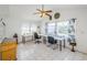 Bright living area features tile floors, neutral paint, and plenty of natural light at 7420 Cay Dr, Port Richey, FL 34668