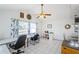 Bright living area with tile floors, neutral paint, and plenty of natural light at 7420 Cay Dr, Port Richey, FL 34668