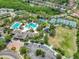 Community amenities include a pool, splash pad, tennis courts, playground, clubhouse, and parking at 7927 Hampton Lake Dr, Tampa, FL 33647