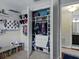 Organized closet with shelves, drawers, and hanging space in a bedroom at 7927 Hampton Lake Dr, Tampa, FL 33647