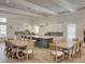 Grand Hampton clubhouse kitchen featuring a large kitchen island and dining tables at 7927 Hampton Lake Dr, Tampa, FL 33647