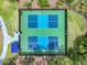 Aerial view of the community's fenced pickleball court at 7927 Hampton Lake Dr, Tampa, FL 33647
