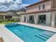 Refreshing pool with an attached spa, perfect for outdoor relaxation and entertaining at 7927 Hampton Lake Dr, Tampa, FL 33647