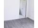 A bright bedroom features tile flooring at 8817 Audrey Ln, Tampa, FL 33615