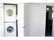 A laundry room includes a washer, dryer, and closet at 8817 Audrey Ln, Tampa, FL 33615