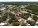 Aerial view of a charming home nestled in a lush neighborhood near the city at 9653 Golden Grove St, Seminole, FL 33772