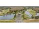 Scenic aerial shot of a golf course community with multiple ponds and lush greenery at 10525 Lucaya Dr, Tampa, FL 33647