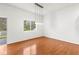 Bright dining room featuring beautiful hardwood floors and a window view at 10525 Lucaya Dr, Tampa, FL 33647