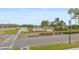 Street view of Heritage Isles entrance sign amidst landscaped surroundings at 10525 Lucaya Dr, Tampa, FL 33647