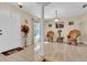 Open foyer with neutral walls, tile flooring, and a decorative floral arrangement at 10907 Kewanee Dr, Temple Terrace, FL 33617