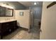 Community bathroom with stylish vanity, ample lighting, and clean amenities for visitors at 11485 Oakhurst Rd # 319, Largo, FL 33774