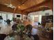 Bright clubhouse featuring a vaulted wood ceiling, ceiling fan, and spacious seating area, perfect for community gatherings at 11485 Oakhurst Rd # 319, Largo, FL 33774