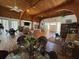 Bright clubhouse featuring a vaulted wood ceiling, ceiling fan, and spacious seating area, perfect for community gatherings at 11485 Oakhurst Rd # 319, Largo, FL 33774