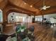 Bright clubhouse featuring a vaulted wood ceiling, ceiling fan, and spacious seating area, perfect for community gatherings at 11485 Oakhurst Rd # 319, Largo, FL 33774