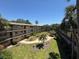 View of the complex courtyard with walking paths and mature landscaping at 11485 Oakhurst Rd # 319, Largo, FL 33774