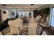 Community gym and game room with exercise equipment, tables, chairs, and open areas for socializing and resident events at 11485 Oakhurst Rd # 319, Largo, FL 33774
