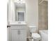 Well-lit bathroom with vanity, toilet, and tiled shower-tub combination for a functional space at 11718 Blackbrook Ct, Seffner, FL 33584