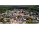 Explore this neighborhood from an aerial perspective, showcasing lush trees and providing a broader sense of the community at 1204 Croydonwood Cir, Brandon, FL 33510