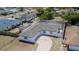 Aerial view of the home showcasing the roof, driveway, and pool, set in a neighborhood at 1204 Croydonwood Cir, Brandon, FL 33510