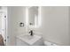 Modern bathroom with updated fixtures, lighting and a quartz countertop at 1204 Croydonwood Cir, Brandon, FL 33510