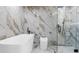 Beautiful bathroom showcasing a modern tub, shower and large tile at 1204 Croydonwood Cir, Brandon, FL 33510
