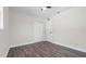 Bright bedroom boasts hardwood floors, ceiling fan, and ample closet space at 1204 Croydonwood Cir, Brandon, FL 33510