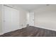 Spacious bedroom is brightened with hardwood floors and standard closet at 1204 Croydonwood Cir, Brandon, FL 33510