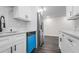 Kitchen with white cabinets, marbled backsplash, and stainless appliances at 1204 Croydonwood Cir, Brandon, FL 33510