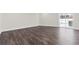 Spacious living room with sliding door leading to an outdoor pool at 1204 Croydonwood Cir, Brandon, FL 33510