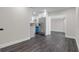 The living room flows into an open kitchen with stainless appliances at 1204 Croydonwood Cir, Brandon, FL 33510