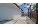 Enclosed patio features a screen and ample room for outdoor enjoyment and seamless transition from the interior to the outdoors at 1204 Croydonwood Cir, Brandon, FL 33510