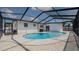 In-ground pool with screened enclosure and updated decking at 1204 Croydonwood Cir, Brandon, FL 33510