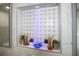 Detailed shot of a shower niche featuring decorative tiles and subtle, stylish accents at 13528 Woodside Dr, Hudson, FL 34667