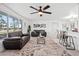 This comfortable living room has stylish furniture, an open layout, and bright, natural light at 1499 Janet Pl, Englewood, FL 34223